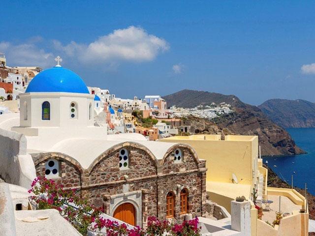 Sun-drenched Santorini awaits visitors to the Greek islands